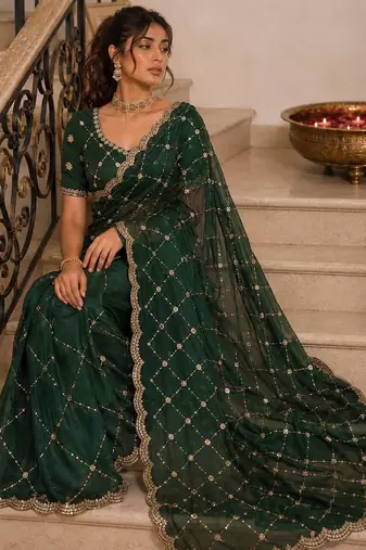 Green embroidered satin saree