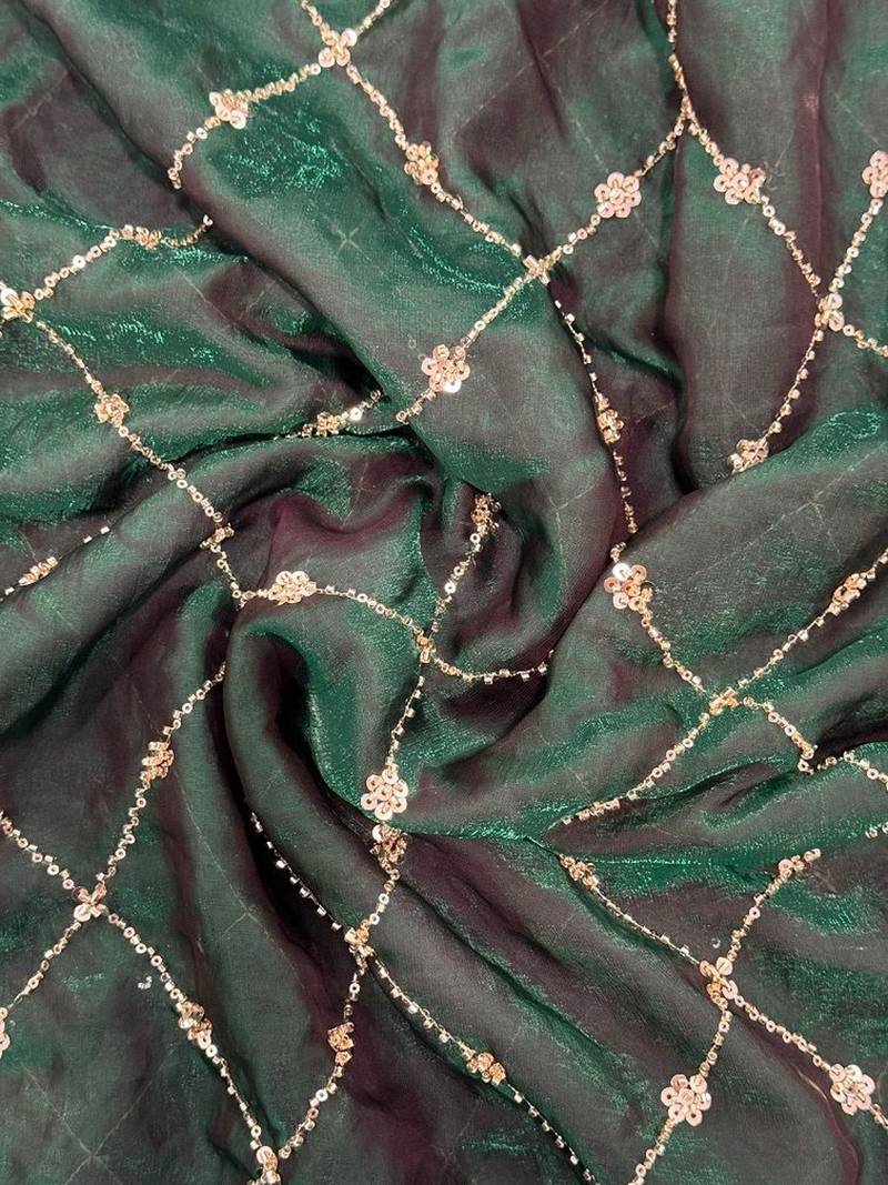 Green embroidered satin saree