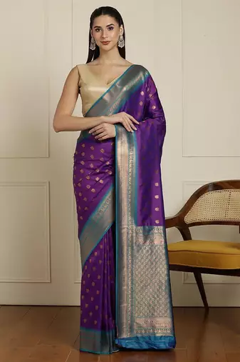 Purple ethnic motifs woven design kanjeevaram saree with blouse