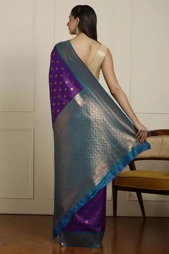 Purple ethnic motifs woven design kanjeevaram saree with blouse