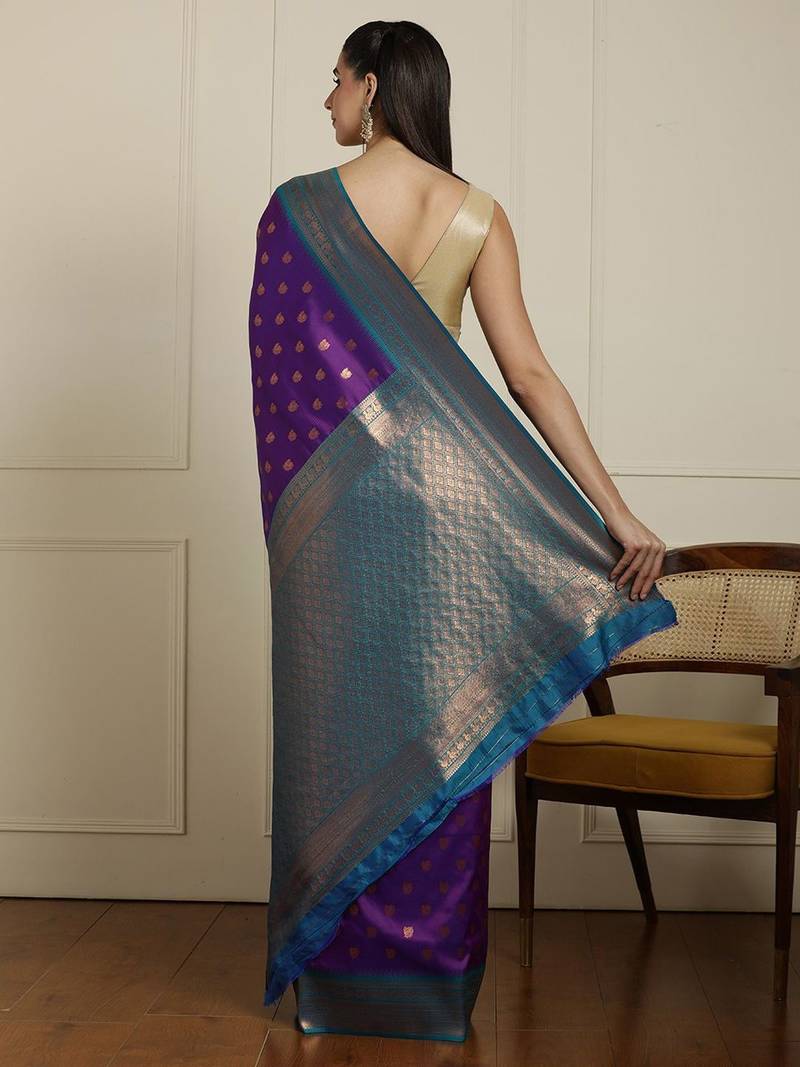 Purple ethnic motifs woven design kanjeevaram saree with blouse