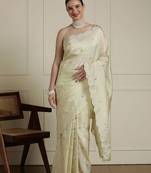 Cream embroidered sequinned georgette saree