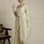 Cream embroidered sequinned georgette saree