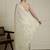 Cream embroidered sequinned georgette saree