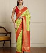Green ethnic motifs woven design zari kanjeevaram saree