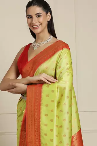 Green ethnic motifs woven design zari kanjeevaram saree