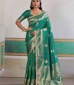 Teal ethnic motifs woven design zari saree with unstitched blouse