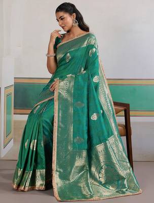 Teal ethnic motifs woven design zari saree with unstitched blouse 4