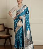 Blue ethnic motifs woven design zari banarasi saree with blouse piece