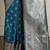 Blue ethnic motifs woven design zari banarasi saree with blouse piece
