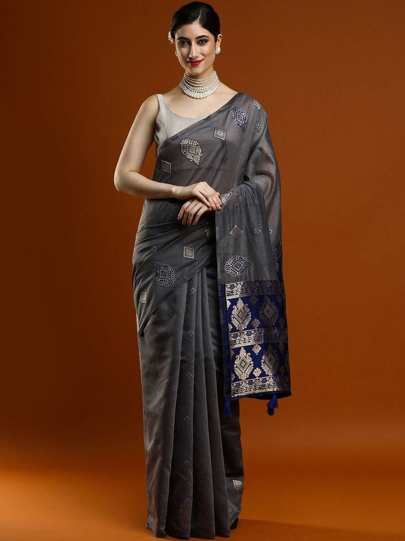 Navy blue woven design muga sarees with blouse piece