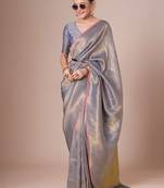 Silver kanjeevaram woven design saree with blouse piece