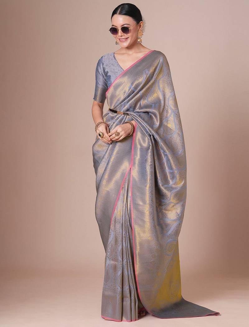 Silver kanjeevaram woven design saree with blouse piece