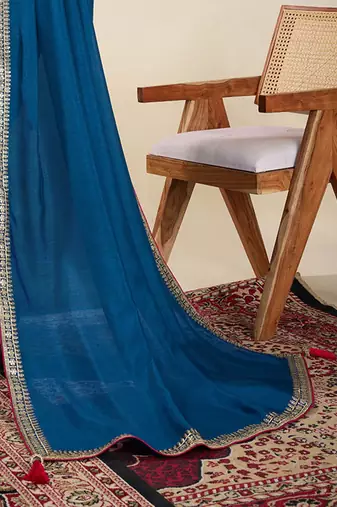 Blue solid saree with stitched blouse