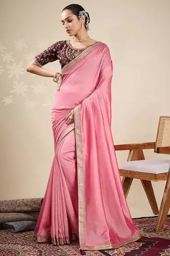 Peach women solid embellished border saree