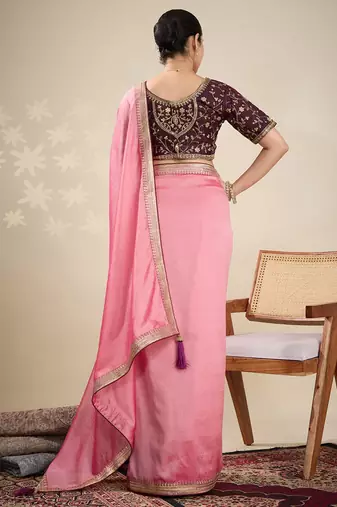 Peach women solid embellished border saree
