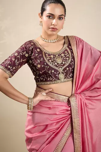Peach women solid embellished border saree