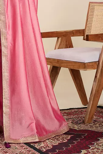 Peach women solid embellished border saree