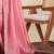Peach women solid embellished border saree
