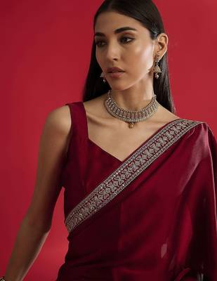 Maroon women embellished bordered sarees 5