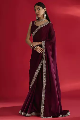 Magenta embellished saree with blouse piece