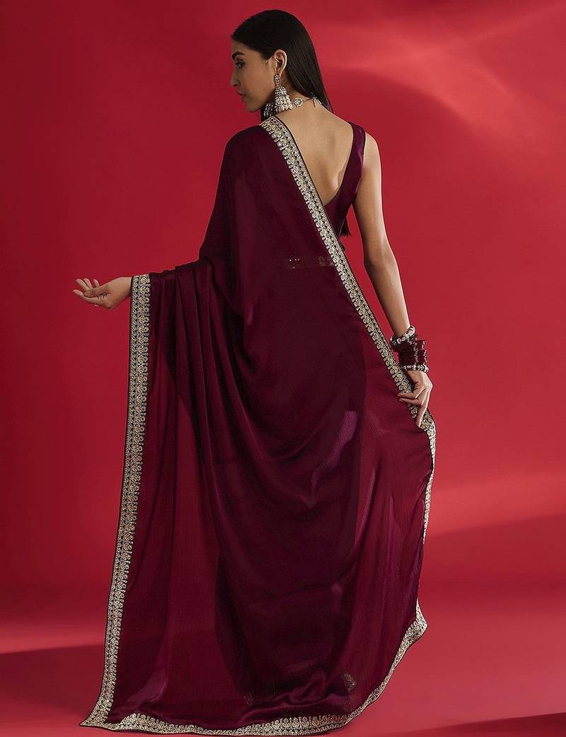 Magenta embellished saree with blouse piece