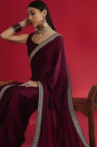 Magenta embellished saree with blouse piece