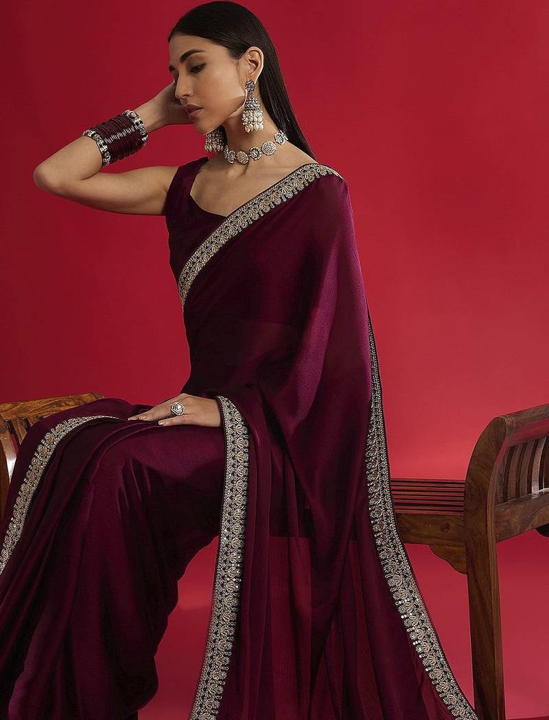 Magenta embellished saree with blouse piece
