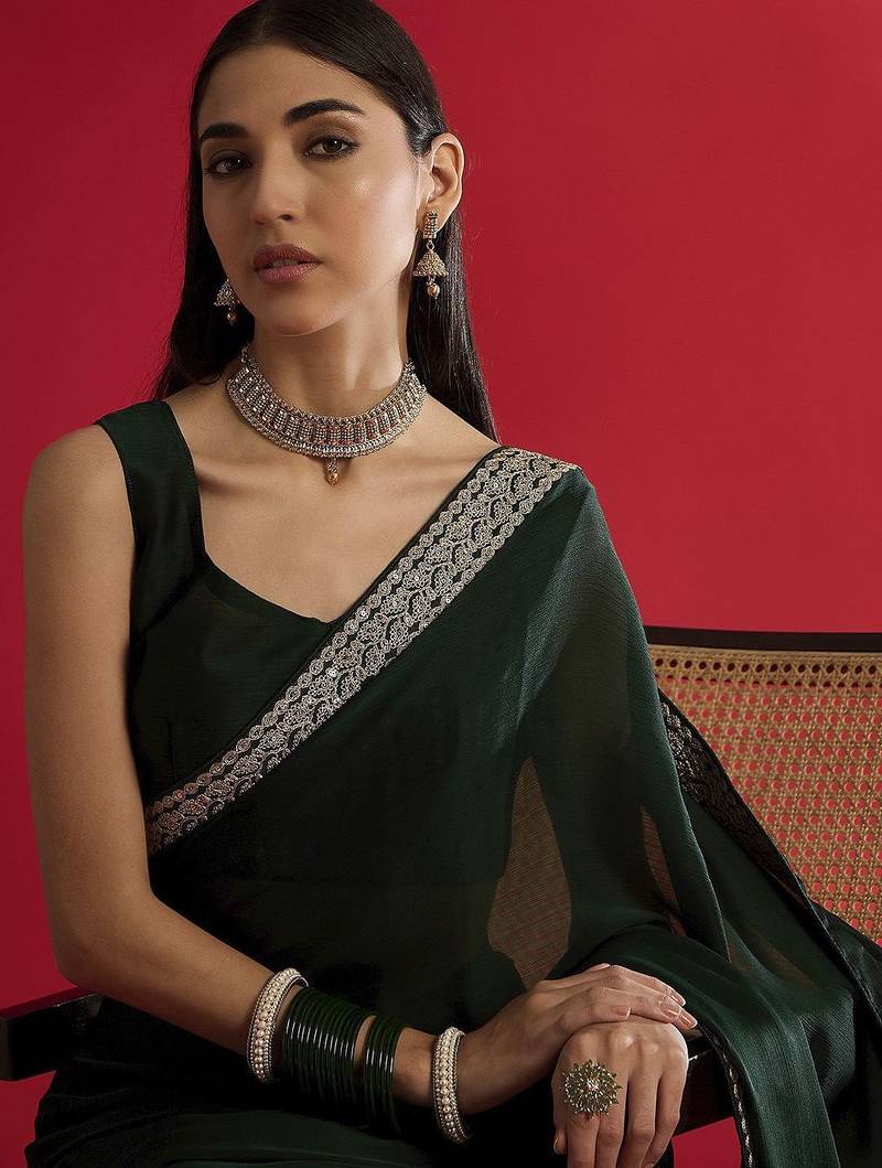 Green embellished saree with blouse piece