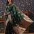 Green ethnic woven design banarasi saree