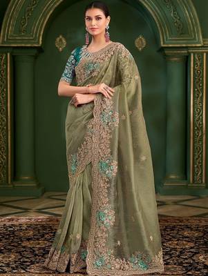 Green embroidered festive wear saree with matching unstitched blouse 1