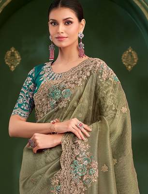 Green embroidered festive wear saree with matching unstitched blouse 2