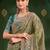 Green embroidered festive wear saree with matching unstitched blouse