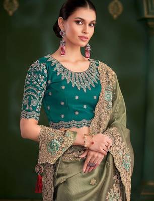 Green embroidered festive wear saree with matching unstitched blouse 3