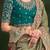 Green embroidered festive wear saree with matching unstitched blouse