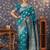 Teal woven design floral zari banarasi saree