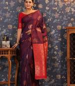 Violet ethnic motifs woven-design saree