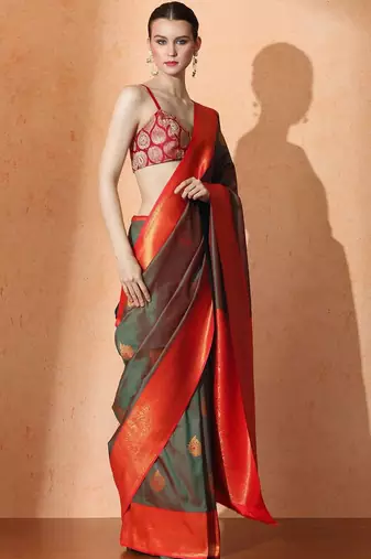 Green woven design saree with blouse