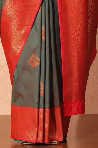 Green woven design saree with blouse