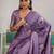 Lavender ethnic motifs woven design zari satin banarasi saree
