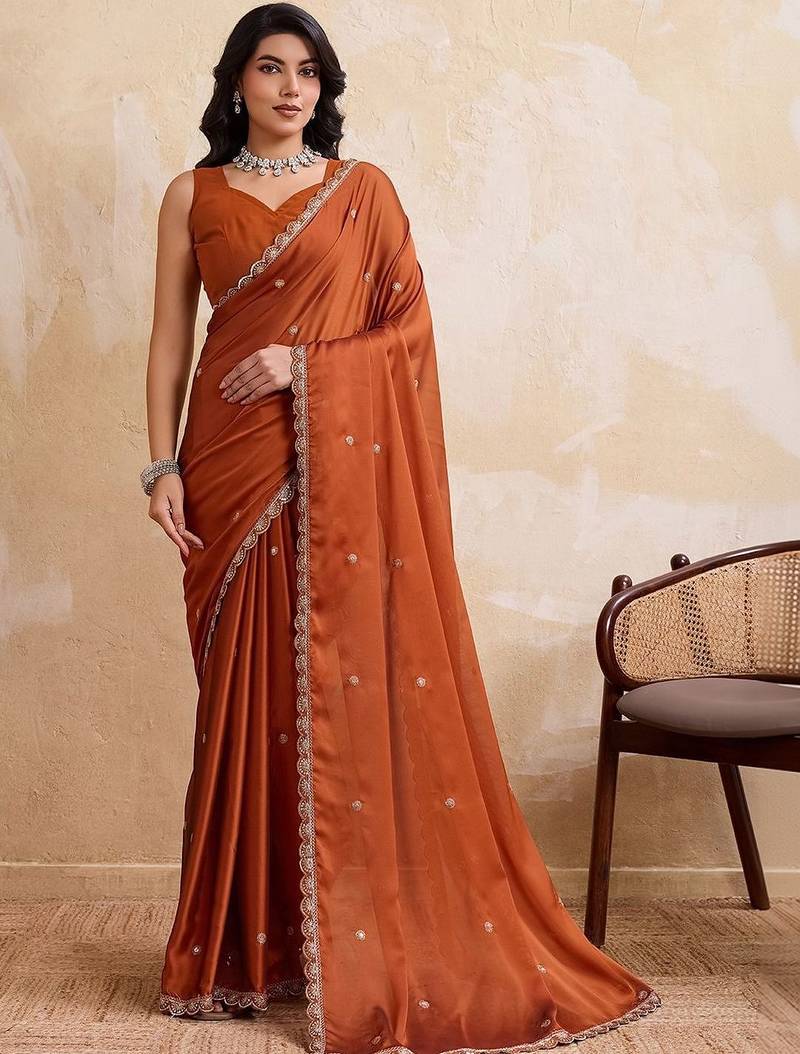 Rust embroidered saree with unstitched blouse