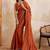 Rust embroidered saree with unstitched blouse