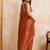 Rust embroidered saree with unstitched blouse