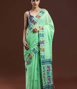 Green woven design muga saree with blouse