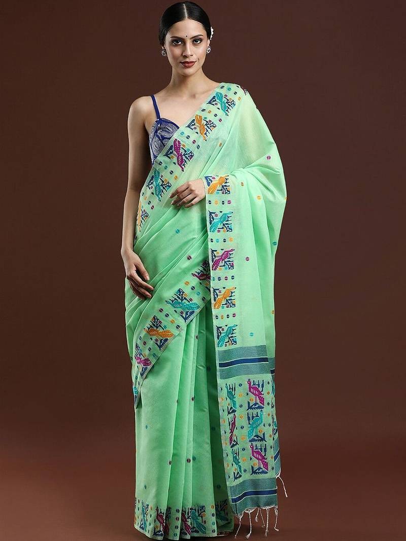 Green woven design muga saree with blouse