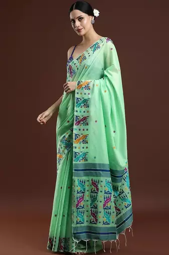 Green woven design muga saree with blouse