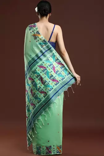 Green woven design muga saree with blouse