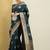Teal teal & gold-toned ethnic motifs zari silk blend banarasi saree