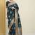 Teal teal & gold-toned ethnic motifs zari silk blend banarasi saree