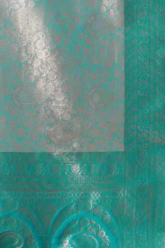 Blue paisley woven kanjeevaram silk design saree